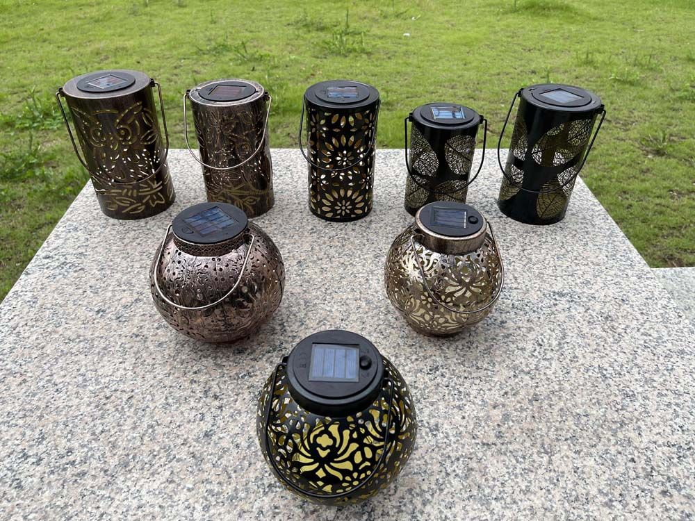 Cylinder-Shape LED Solar Metal Lantern Leaves Patterns Hollow Carved with Handle