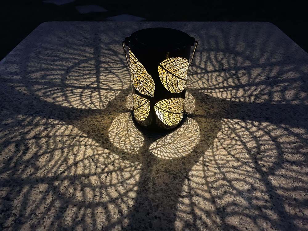 Cylinder-Shape LED Solar Metal Lantern Leaves Patterns Hollow Carved with Handle